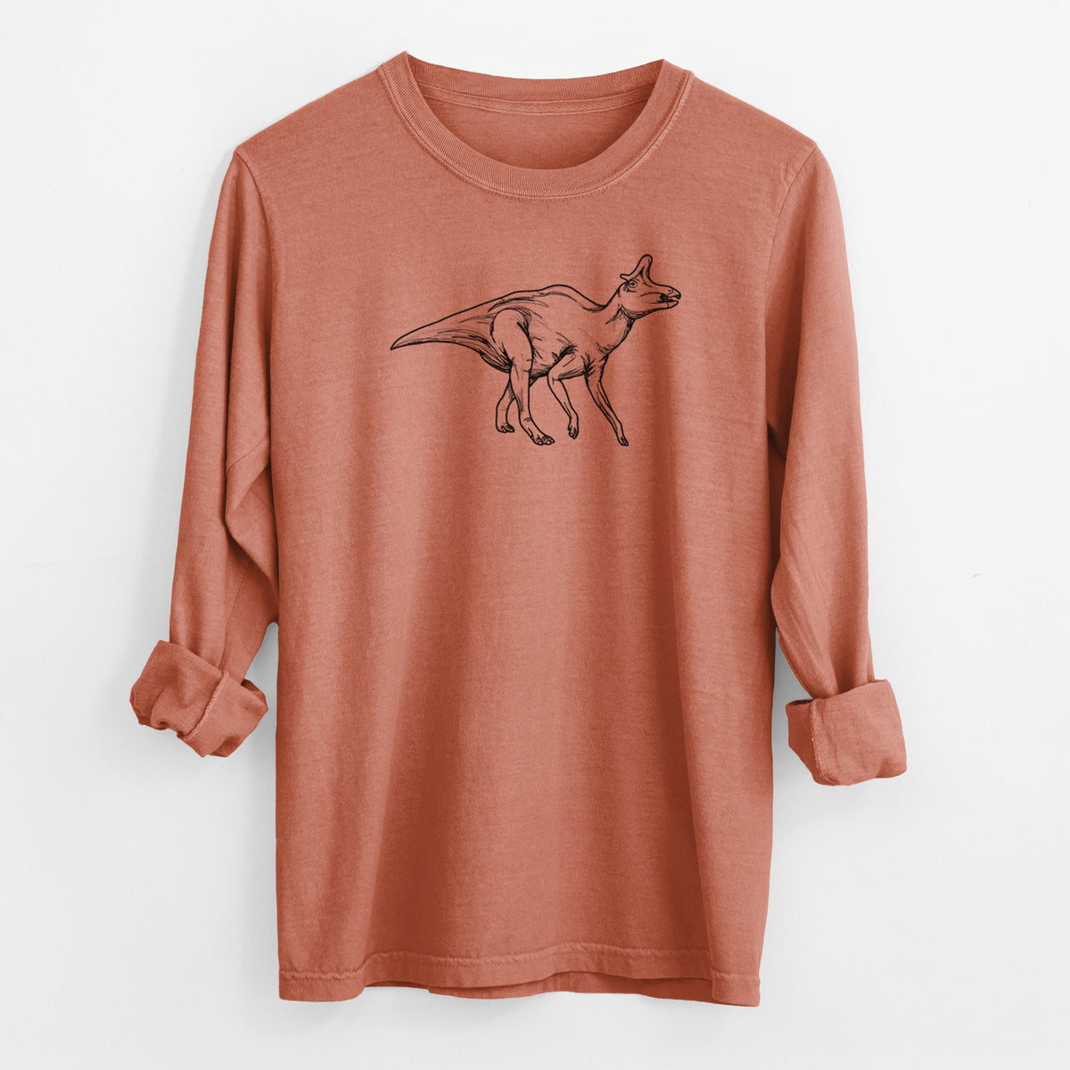 Yam burnt orange Comfort Colors long sleeve shirt laid flat with the cuffs rolled, printed with a black ink illustration of a crested Lambeosaurus walking.