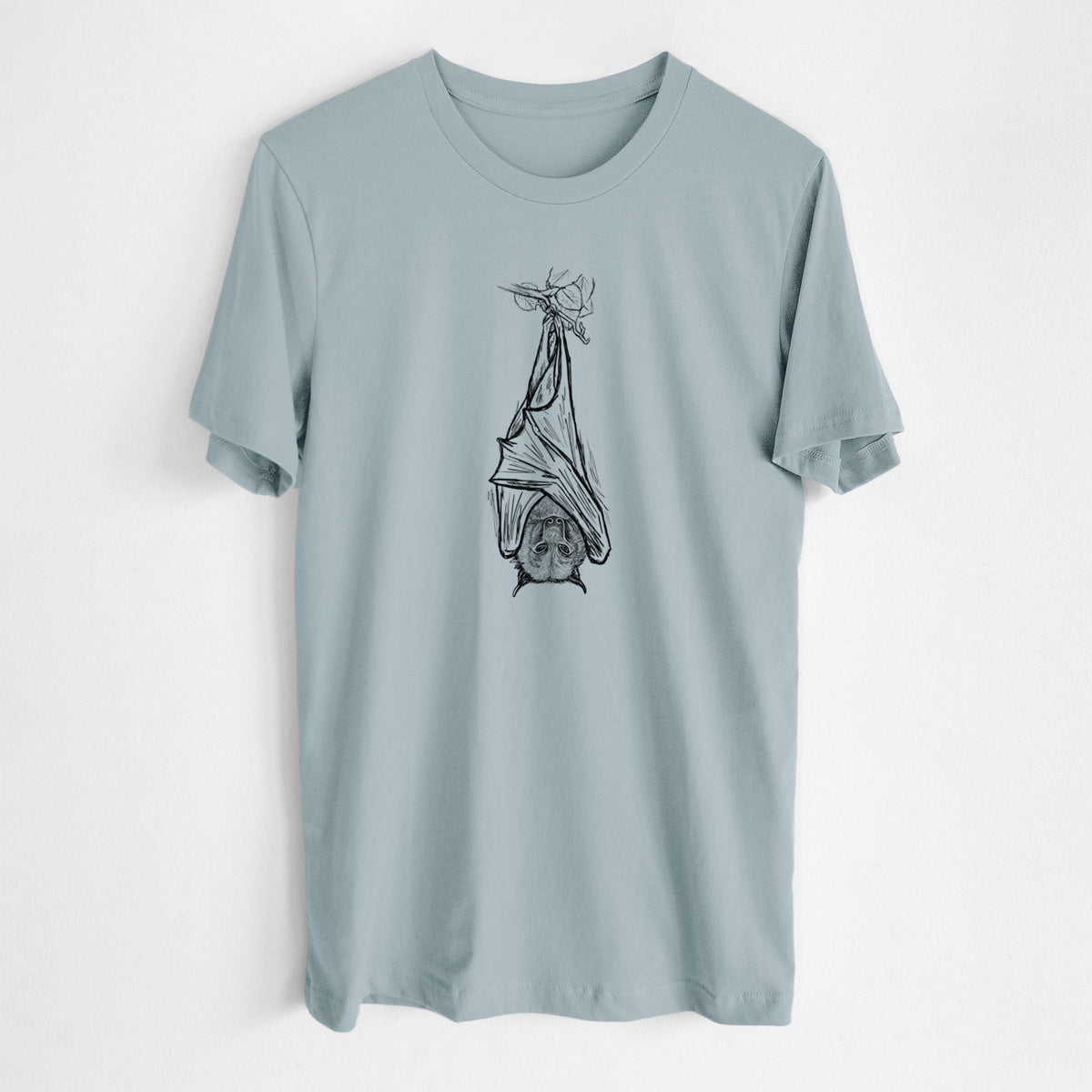 Vintage denim lightweight cotton t-shirt laid flat, printed with a black ink illustration of a large flying fox bat hanging upside down with its wings wrapped around it.