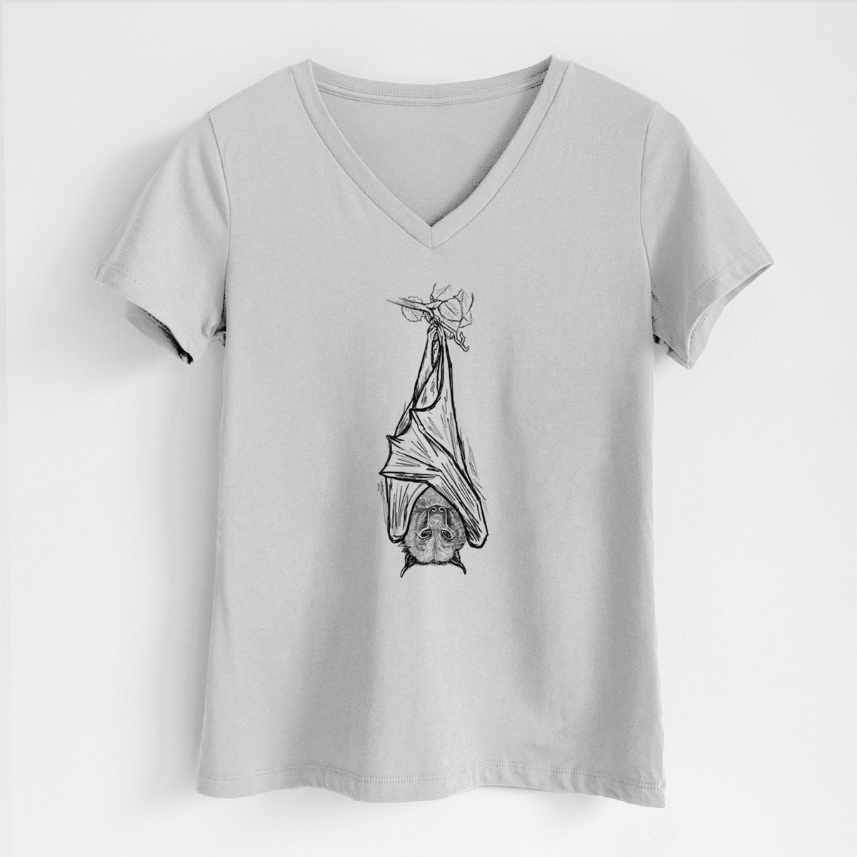 Lunar grey women's relaxed fit cotton V-neck t-shirt laid flat, printed with a black ink illustration of a large flying fox bat hanging upside down with its wings wrapped around it.