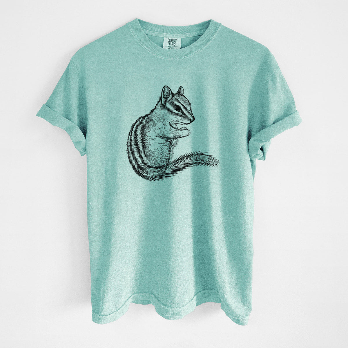 Chalky mint Comfort Colors t-shirt laid flat, printed with a detailed black ink illustration of a least chipmunk sitting and holding food in its paws.