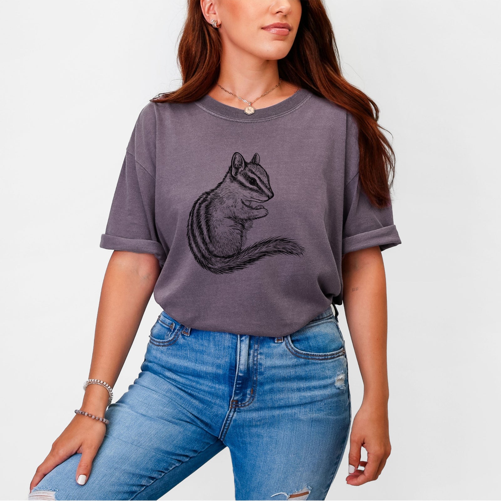 Blue jean Comfort Colors t-shirt laid flat, printed with a detailed black ink illustration of a least chipmunk sitting and holding food in its paws.
