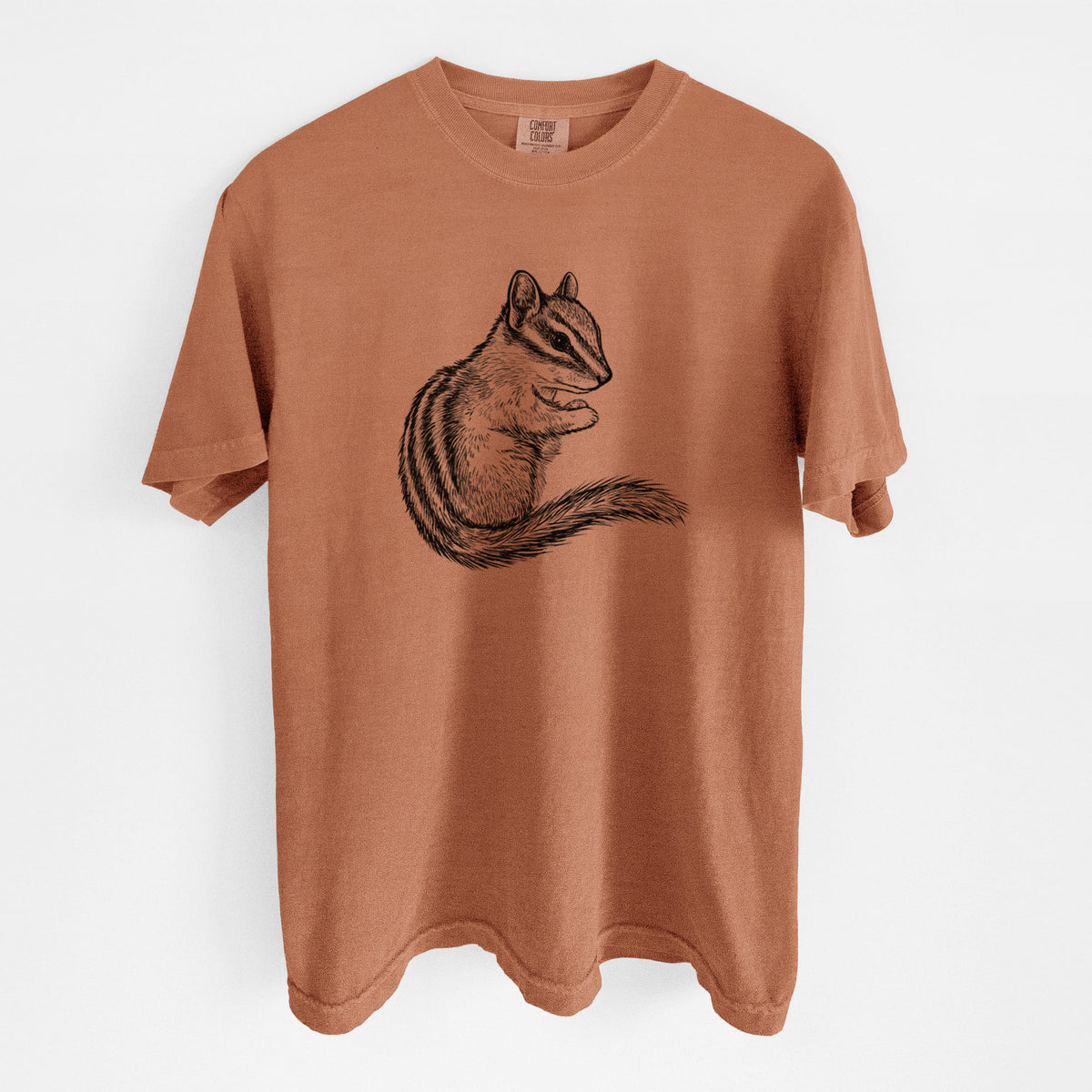 Yam burnt orange Comfort Colors t-shirt laid flat, printed with a detailed black ink illustration of a least chipmunk sitting and holding food in its paws.