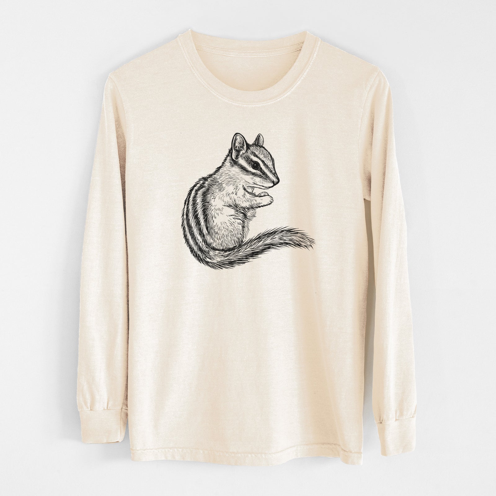 Ivory Comfort Colors long sleeve shirt laid flat, printed with a detailed black ink illustration of a least chipmunk sitting and holding food in its paws.