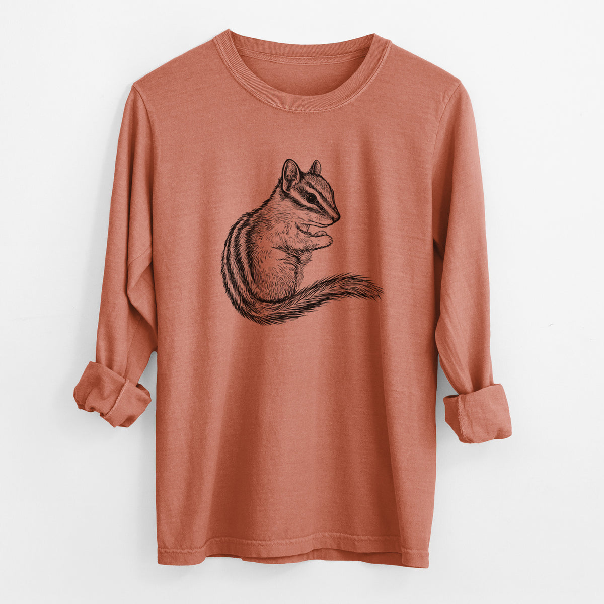 Yam burnt orange Comfort Colors long sleeve shirt laid flat with the cuffs rolled, printed with a detailed black ink illustration of a least chipmunk sitting and holding food in its paws.