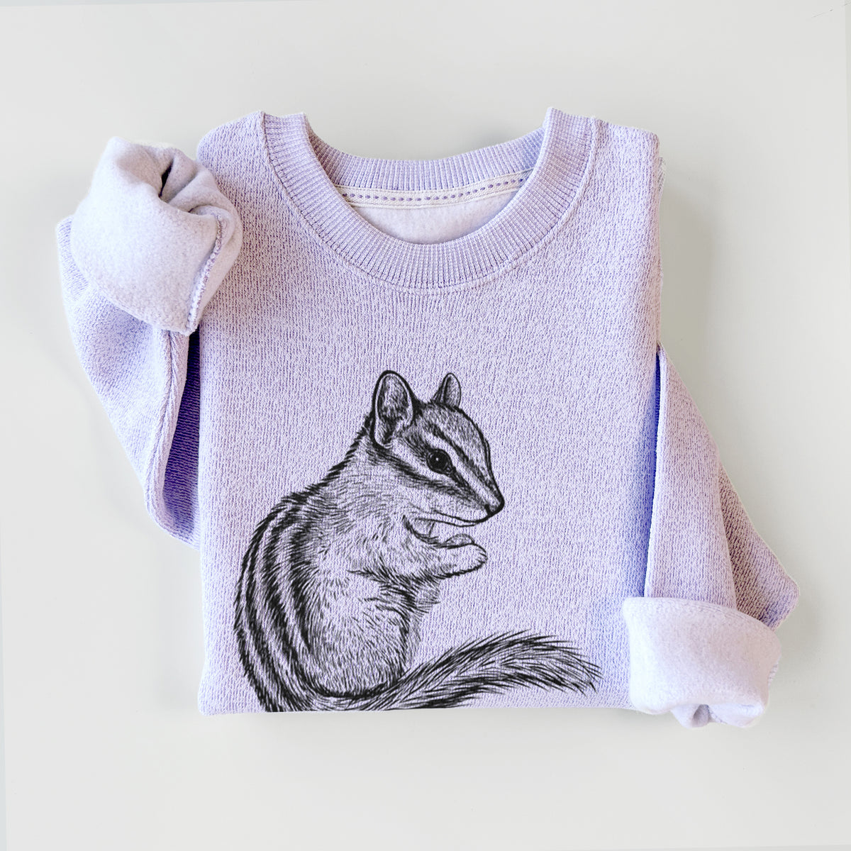 Ice purple knit sweatshirt printed with a detailed black ink illustration of a least chipmunk sitting and holding food in its paws, styled flat.