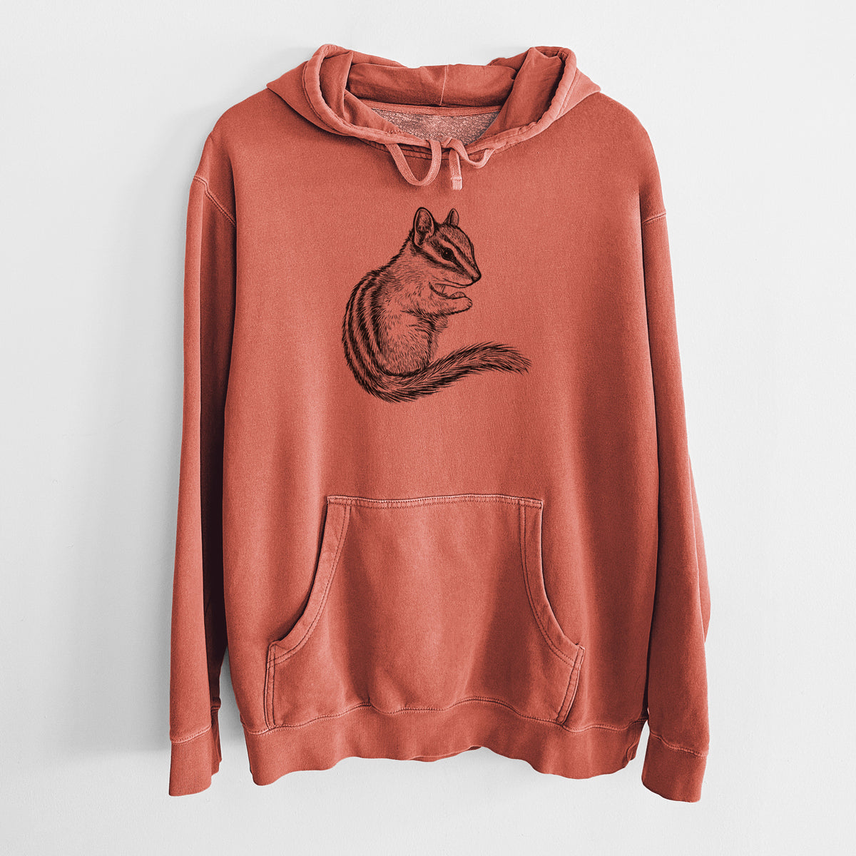 Amber orange pigment dyed hoodie laid flat, printed with a detailed black ink illustration of a least chipmunk sitting and holding food in its paws.