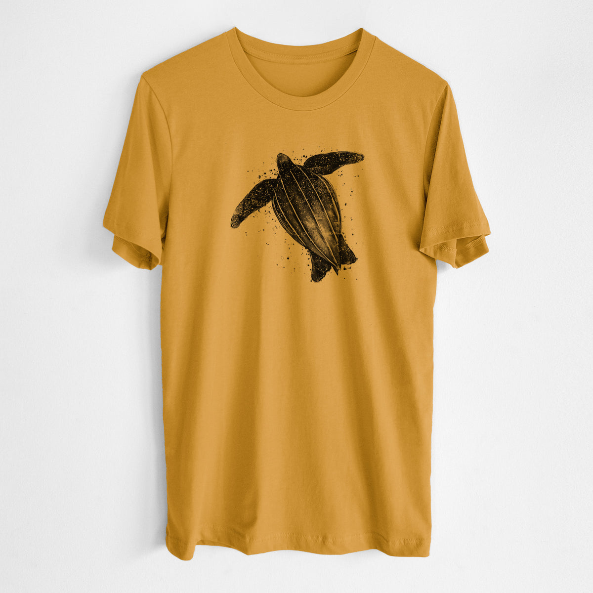 Honeycomb yellow lightweight cotton t-shirt laid flat, printed with a black ink illustration of a leatherback sea turtle swimming, with ink splatters.