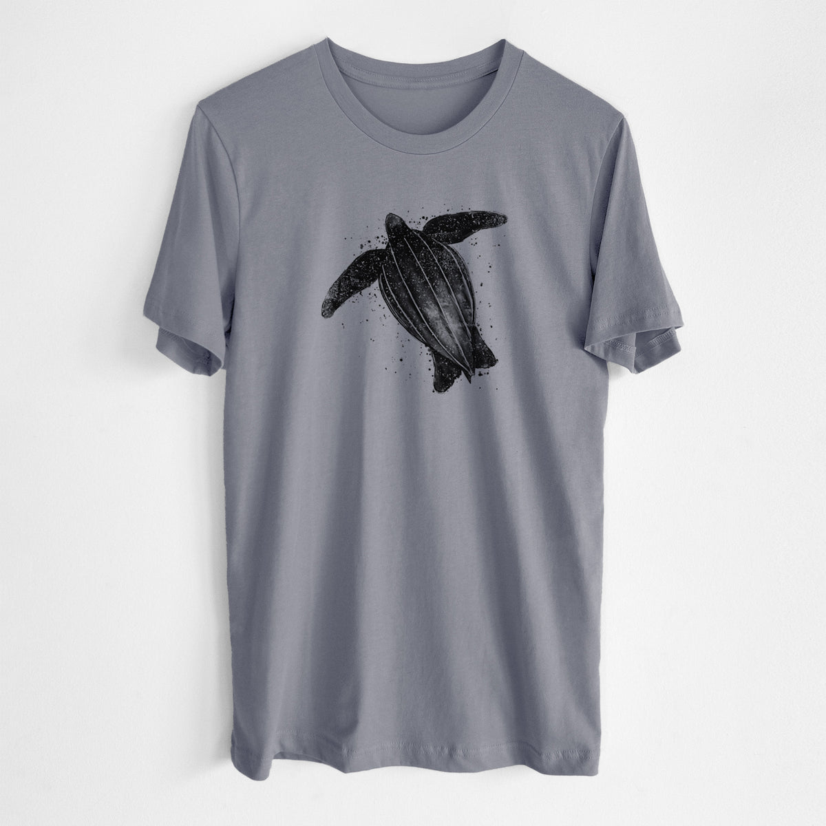 Storm grey lightweight cotton t-shirt laid flat, printed with a black ink illustration of a leatherback sea turtle swimming, with ink splatters.