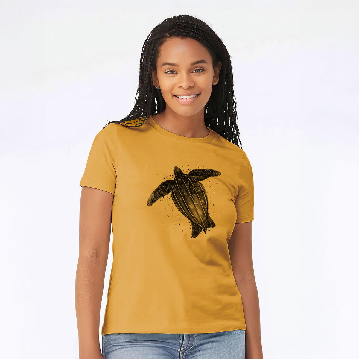 Woman wearing a mustard yellow women's relaxed fit cotton t-shirt printed with a black ink illustration of a leatherback sea turtle swimming, with ink splatters.