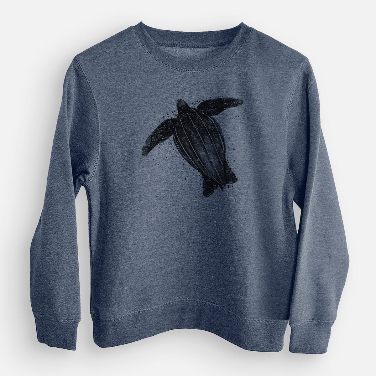 Storm blue youth crewneck sweatshirt laid flat, printed with a black ink illustration of a leatherback sea turtle swimming, with ink splatters.