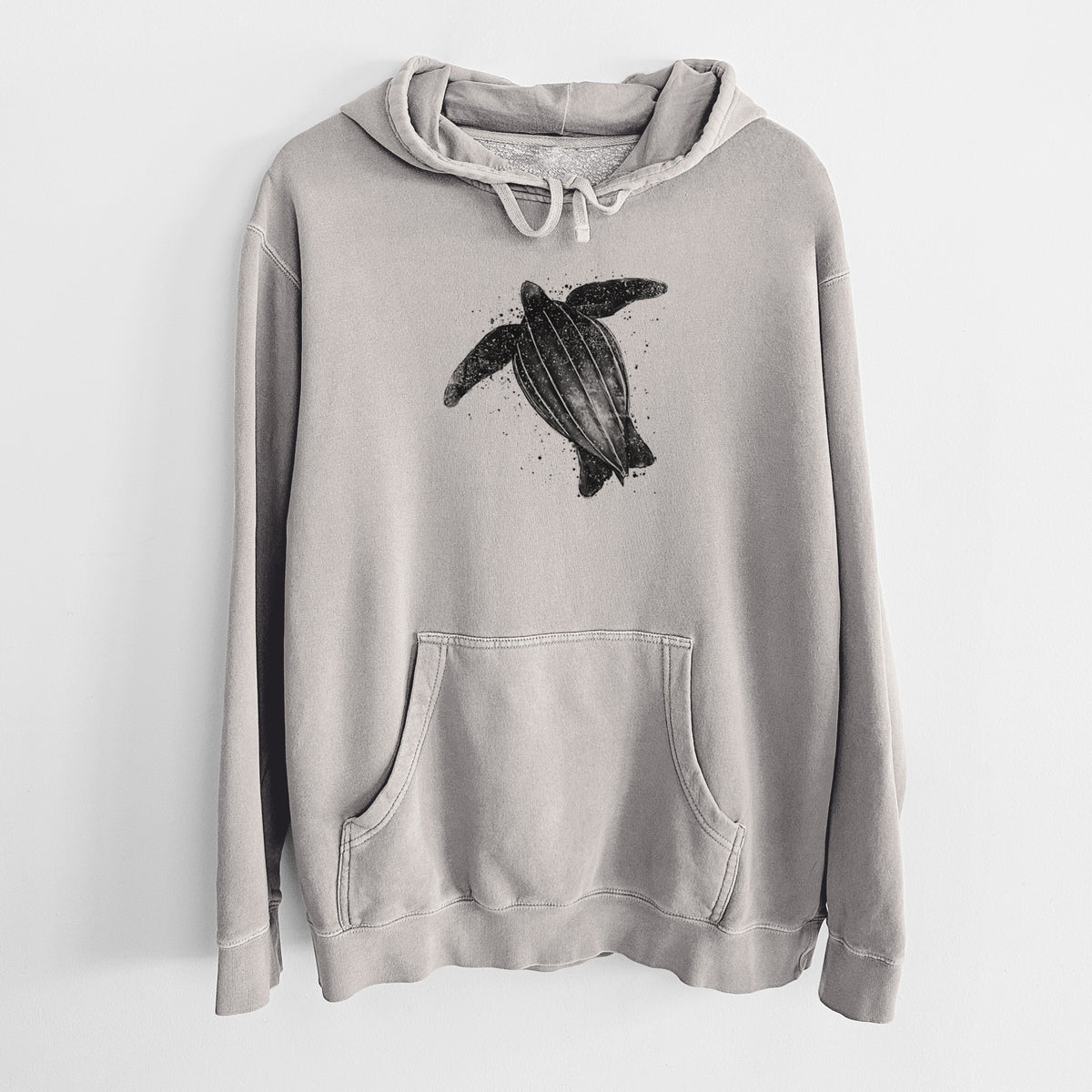 Cement grey pigment dyed hoodie laid flat, printed with a black ink illustration of a leatherback sea turtle swimming, with ink splatters.