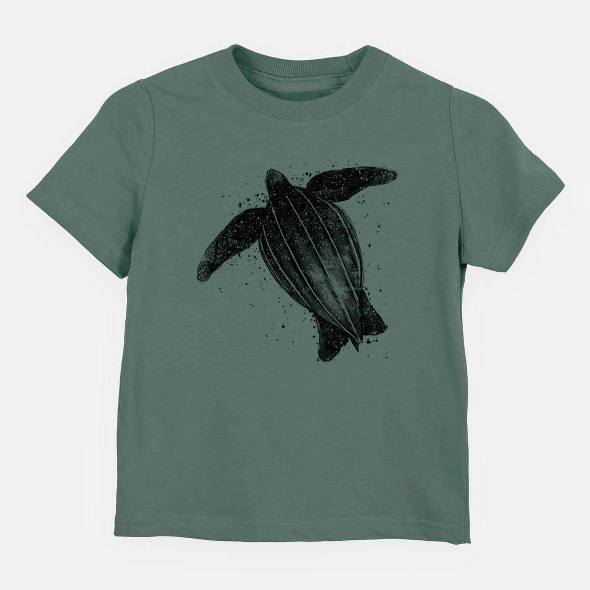 Basil green toddler t-shirt laid flat, printed with a black ink illustration of a leatherback sea turtle swimming, with ink splatters.