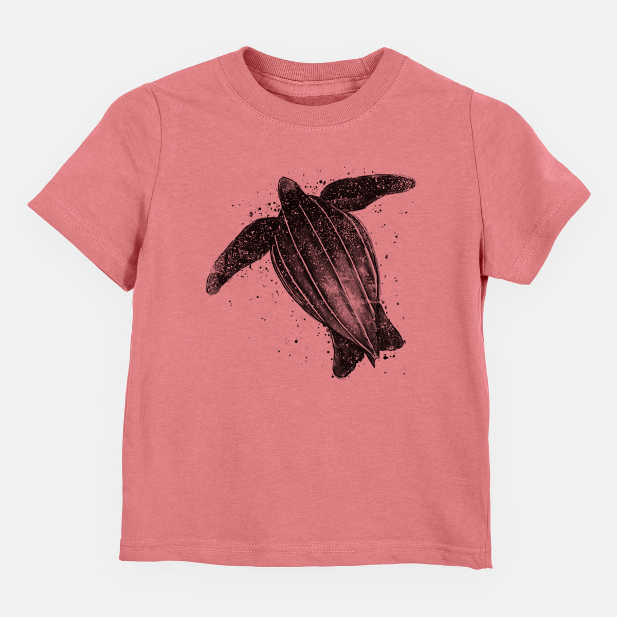 Mauve pink toddler t-shirt laid flat, printed with a black ink illustration of a leatherback sea turtle swimming, with ink splatters.