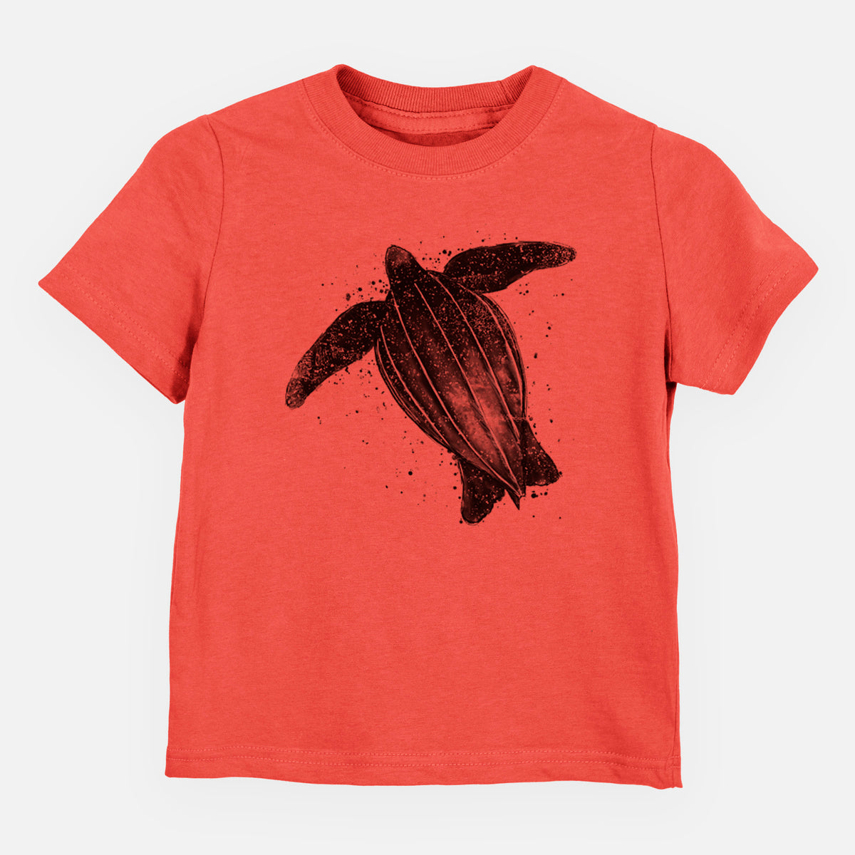 Passionfruit pink toddler t-shirt laid flat, printed with a black ink illustration of a leatherback sea turtle swimming, with ink splatters.