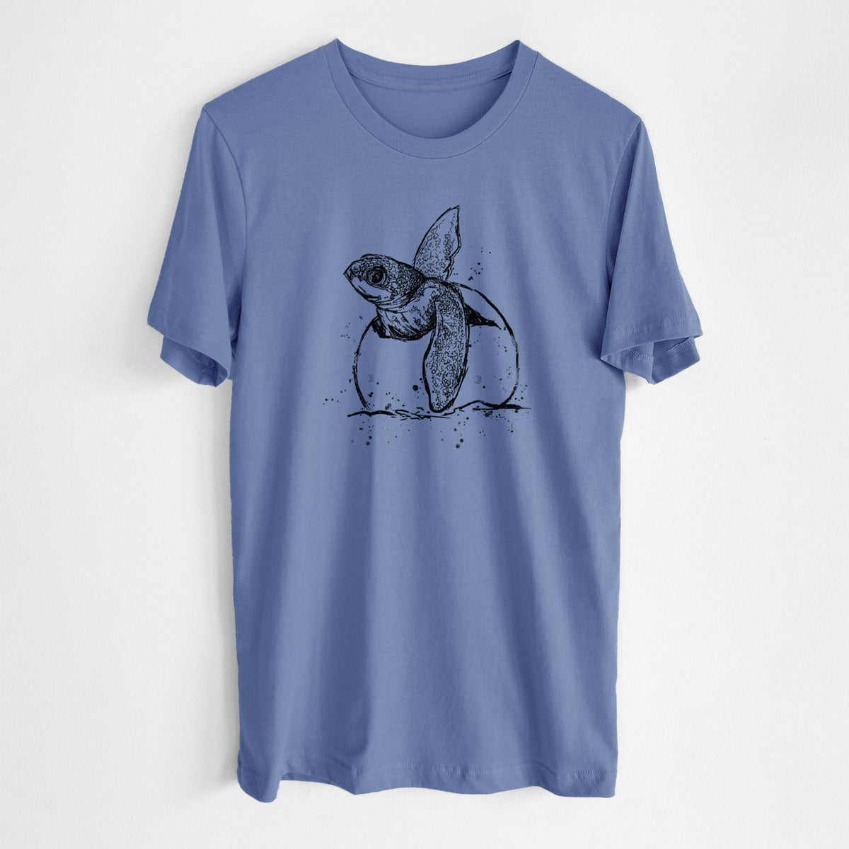Blue bell lightweight cotton t-shirt laid flat, printed with a black ink illustration of a leatherback sea turtle hatchling emerging from its egg.