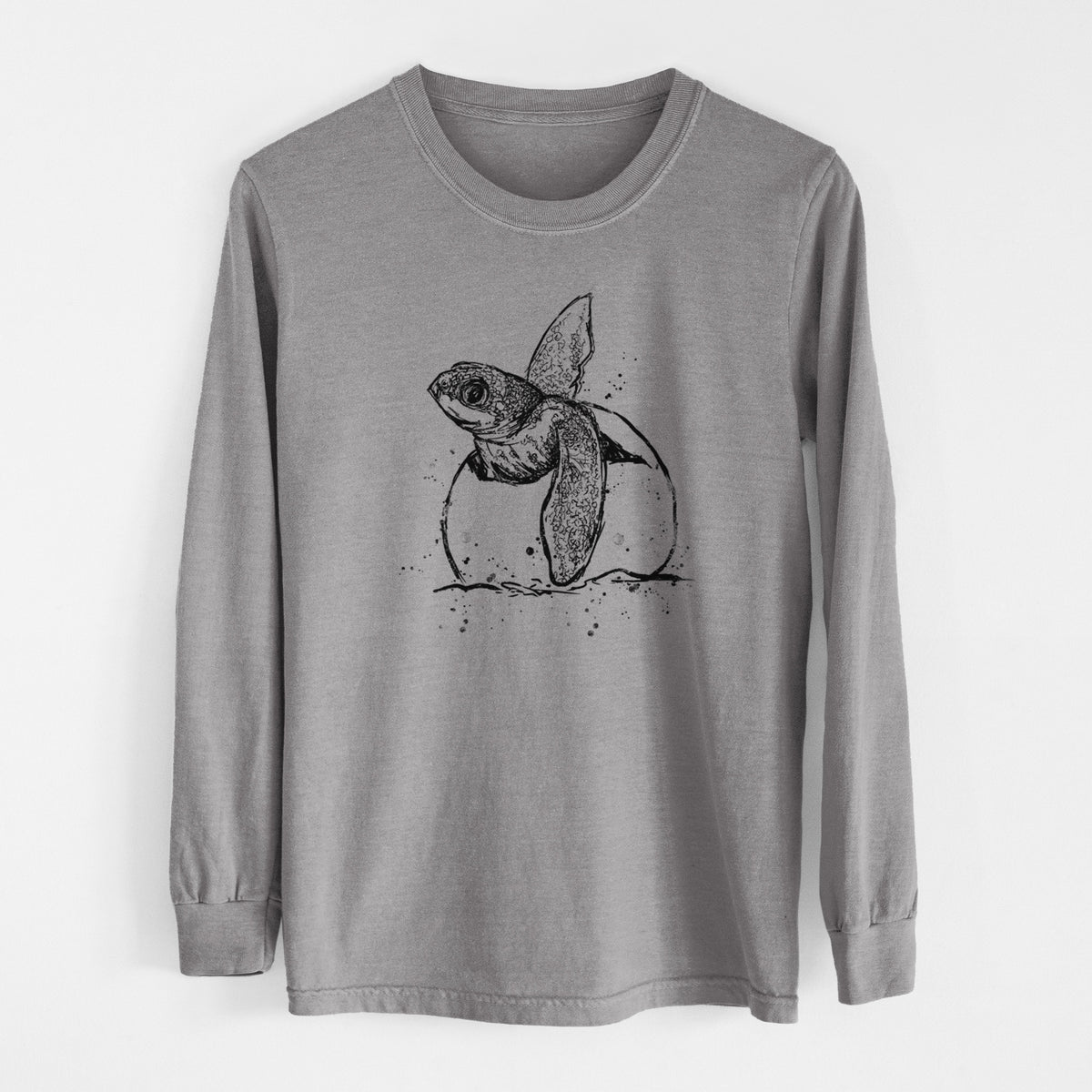 Grey Comfort Colors long sleeve shirt laid flat, printed with a black ink illustration of a leatherback sea turtle hatchling emerging from its egg.