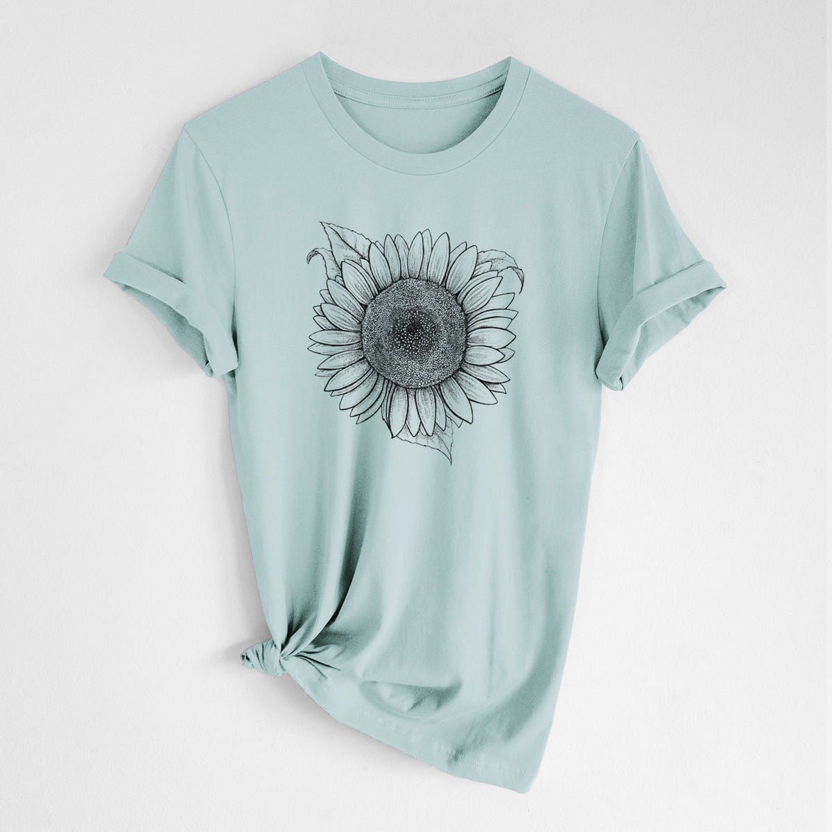 Dusty blue lightweight cotton t-shirt laid flat with the sleeves rolled, printed with a detailed black ink line drawing of a Lemon Queen sunflower in bloom.