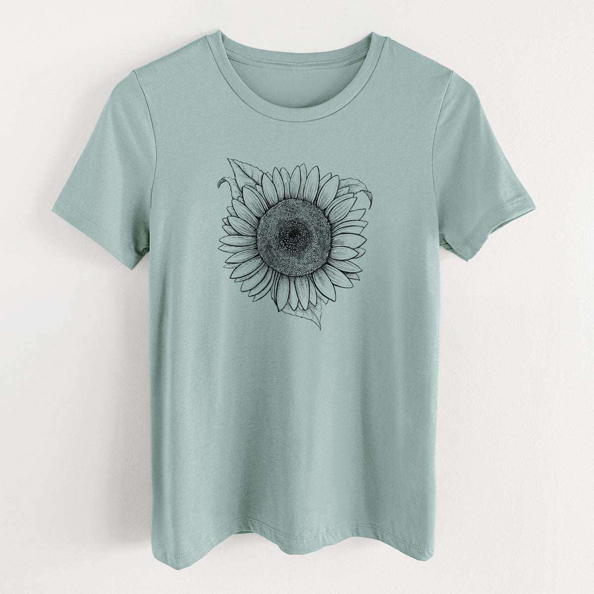 Dusty blue women's relaxed fit cotton t-shirt laid flat, printed with a detailed black ink line drawing of a Lemon Queen sunflower in bloom.