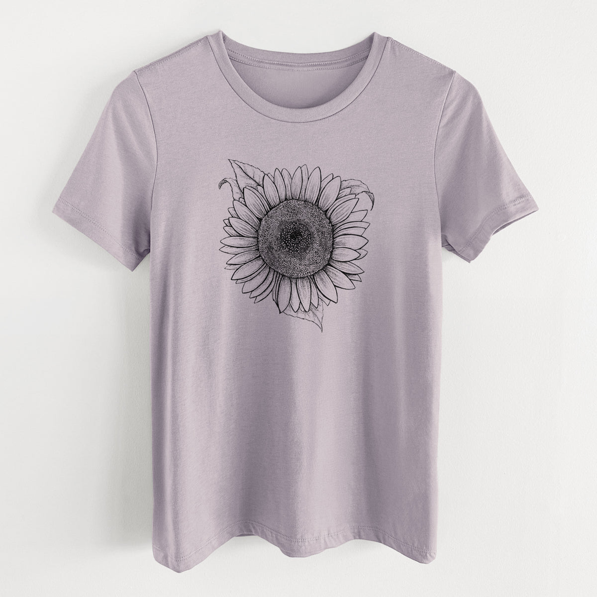Light violet women's relaxed fit cotton t-shirt laid flat, printed with a detailed black ink line drawing of a Lemon Queen sunflower in bloom.