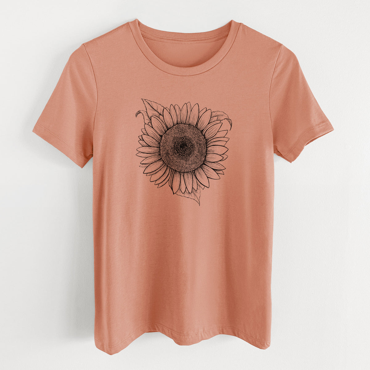 Terracotta orange women's relaxed fit cotton t-shirt laid flat, printed with a detailed black ink line drawing of a Lemon Queen sunflower in bloom.