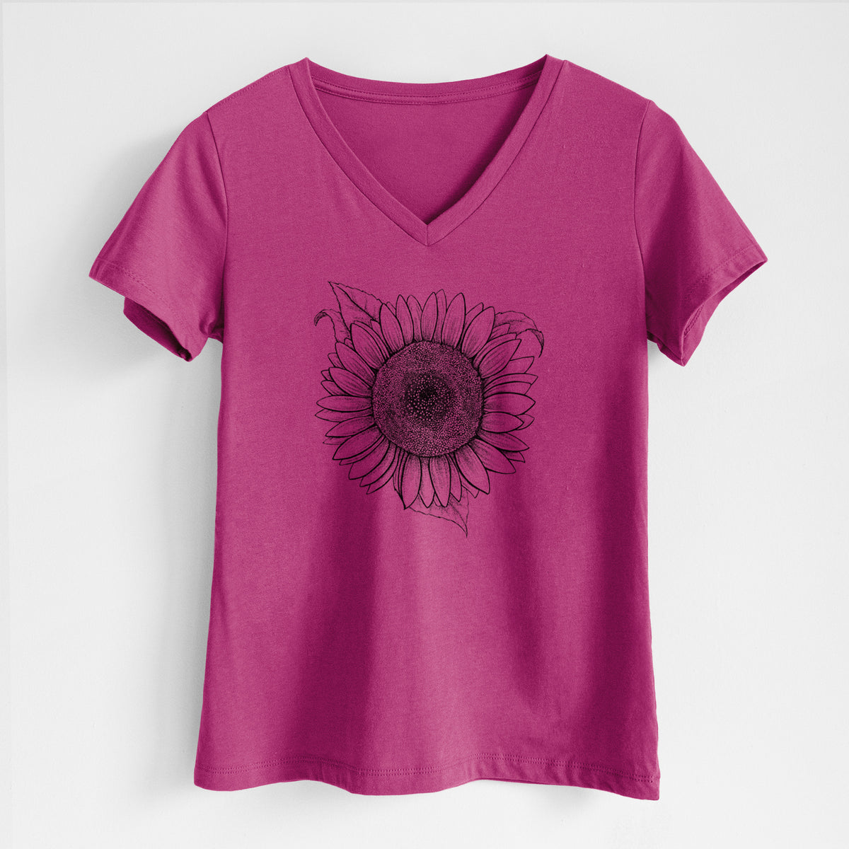 Berry pink women's relaxed fit cotton V-neck t-shirt laid flat, printed with a detailed black ink line drawing of a Lemon Queen sunflower in bloom.