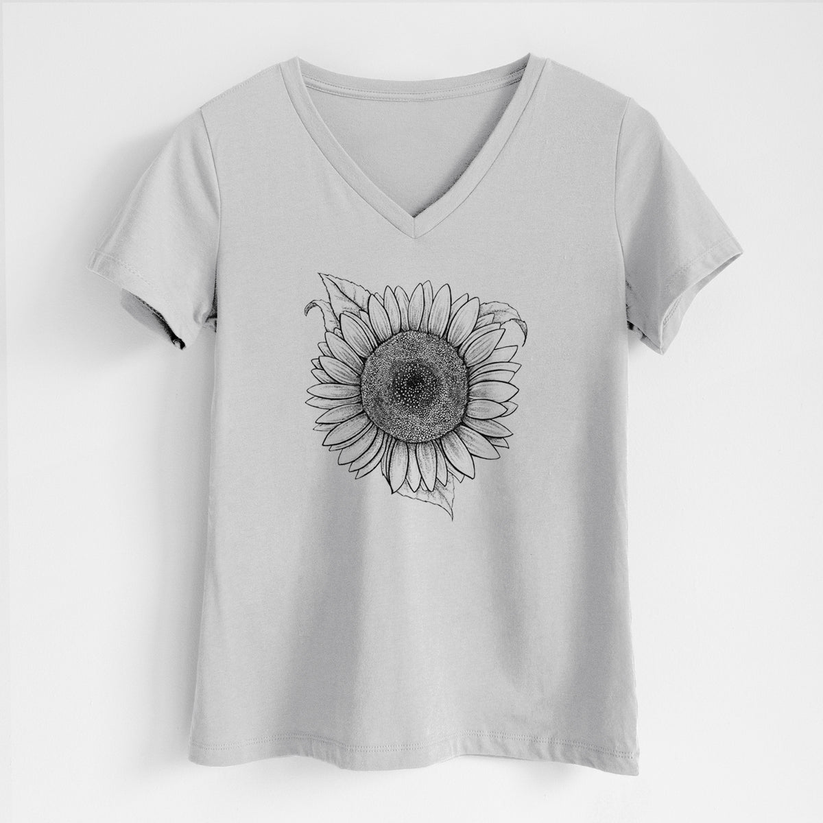 Lunar grey women's relaxed fit cotton V-neck t-shirt laid flat, printed with a detailed black ink line drawing of a Lemon Queen sunflower in bloom.