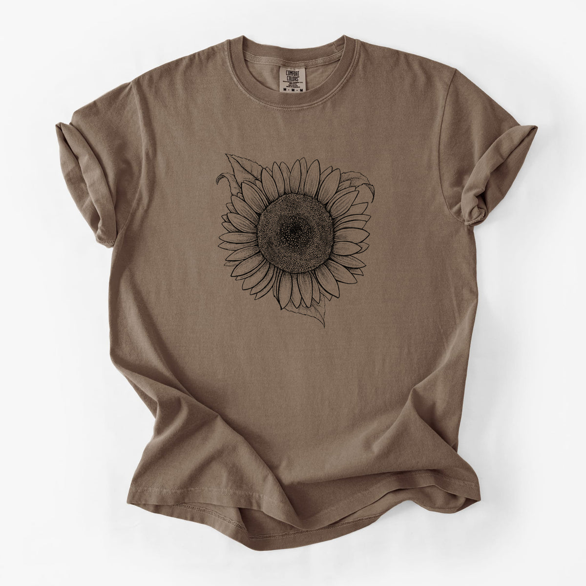 Espresso brown Comfort Colors t-shirt laid flat, printed with a detailed black ink line drawing of a Lemon Queen sunflower in bloom.