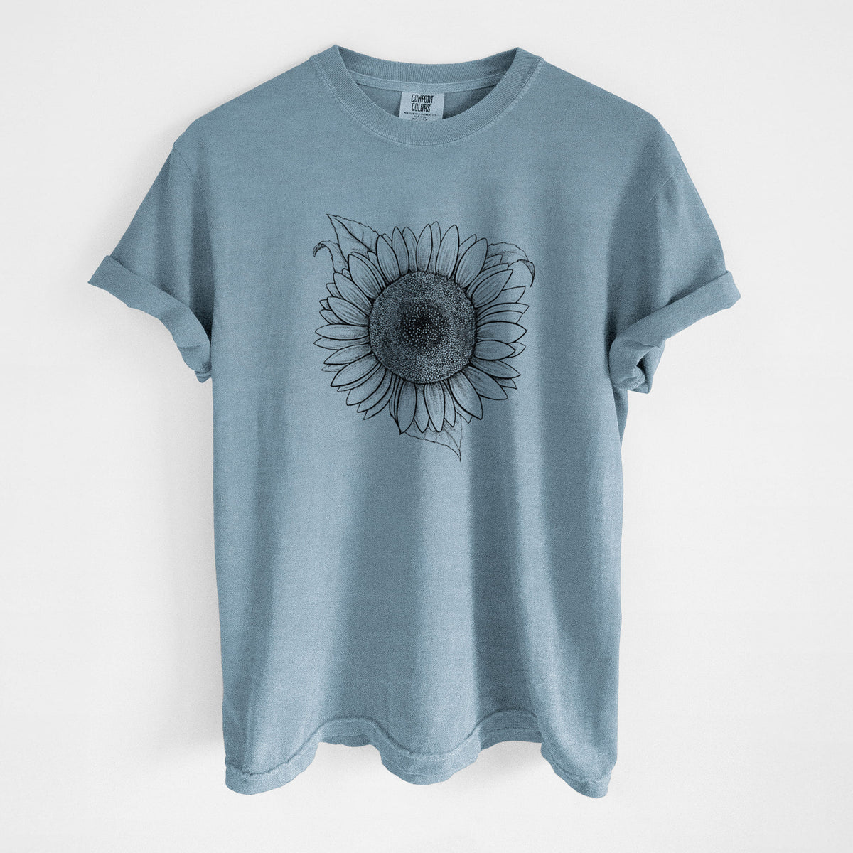 Steel blue Comfort Colors t-shirt laid flat, printed with a detailed black ink line drawing of a Lemon Queen sunflower in bloom.