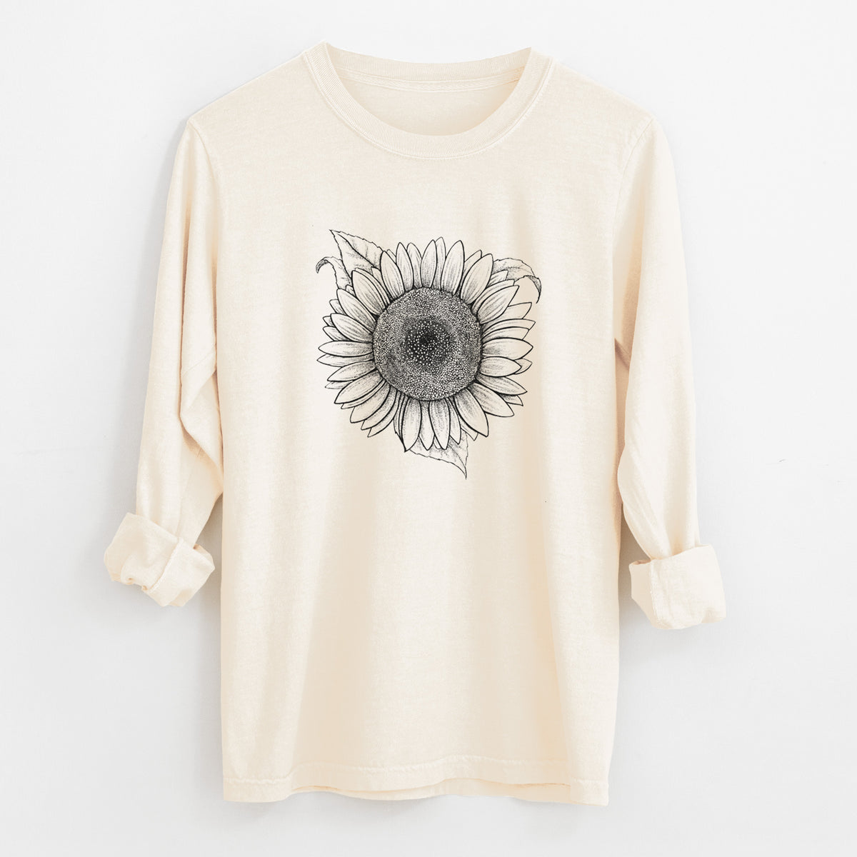 Ivory Comfort Colors long sleeve shirt laid flat with the cuffs rolled, printed with a detailed black ink line drawing of a Lemon Queen sunflower in bloom.