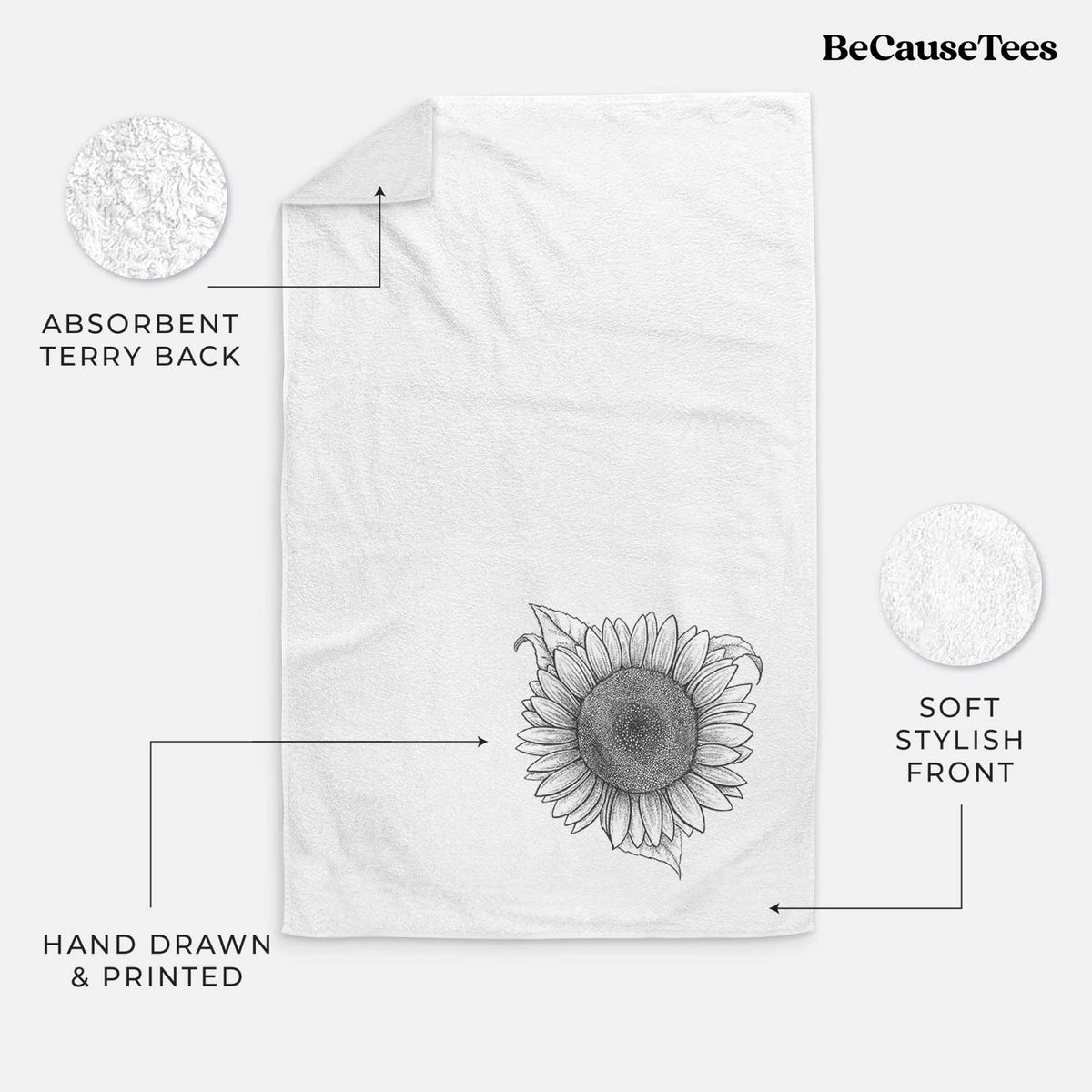 White hand towel printed with a detailed black ink line drawing of a Lemon Queen sunflower in bloom.