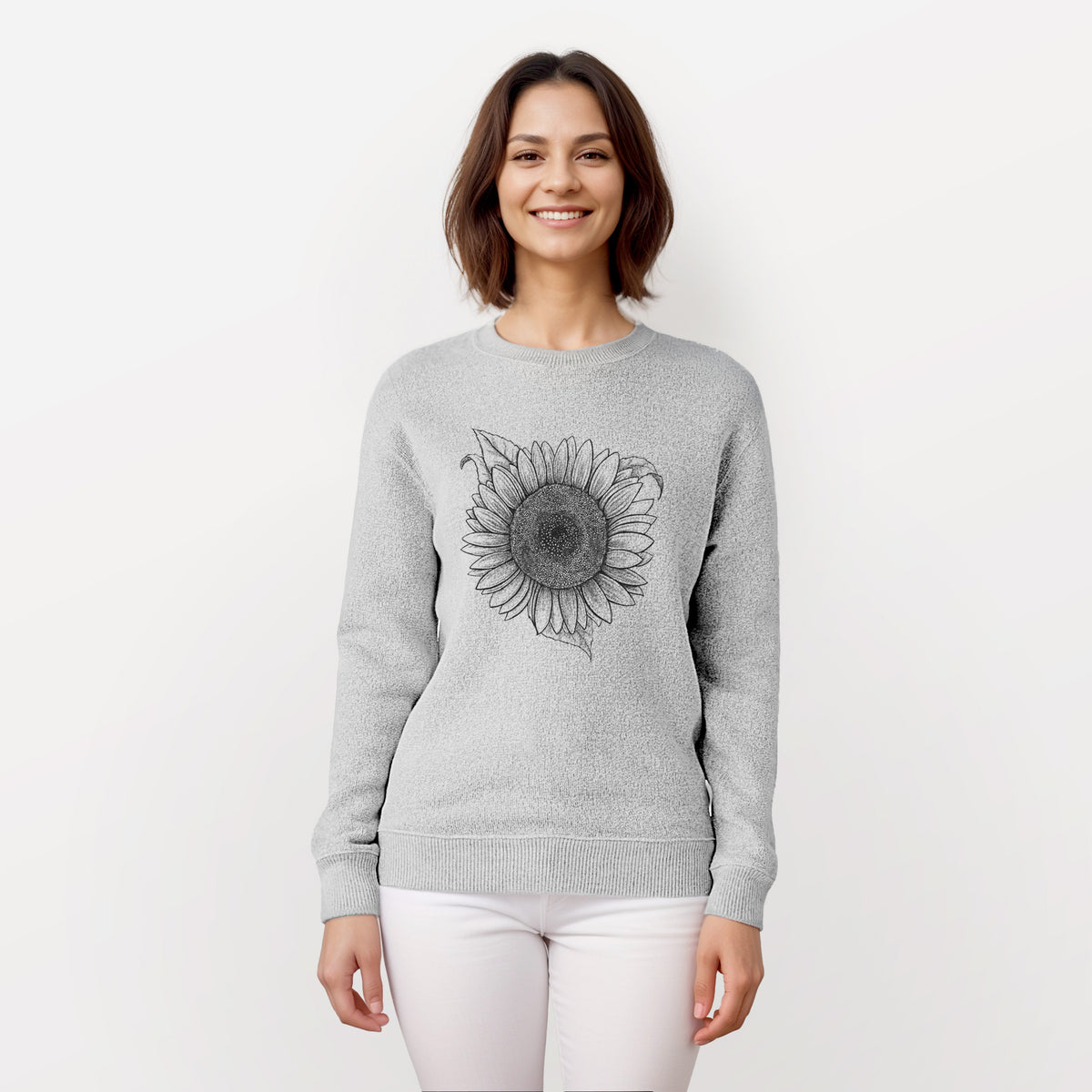 Woman wearing a knit sweatshirt printed with a detailed black ink line drawing of a Lemon Queen sunflower in bloom.