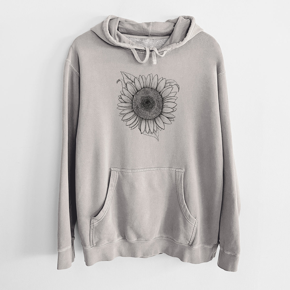 Cement grey pigment dyed hoodie laid flat, printed with a detailed black ink line drawing of a Lemon Queen sunflower in bloom.
