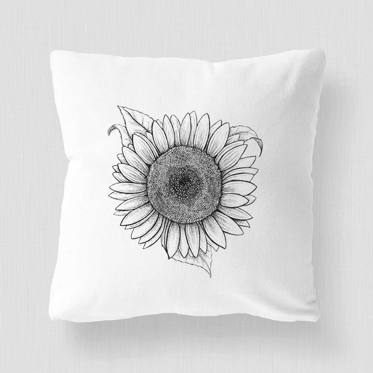 White pillow cover printed with a detailed black ink line drawing of a Lemon Queen sunflower in bloom.