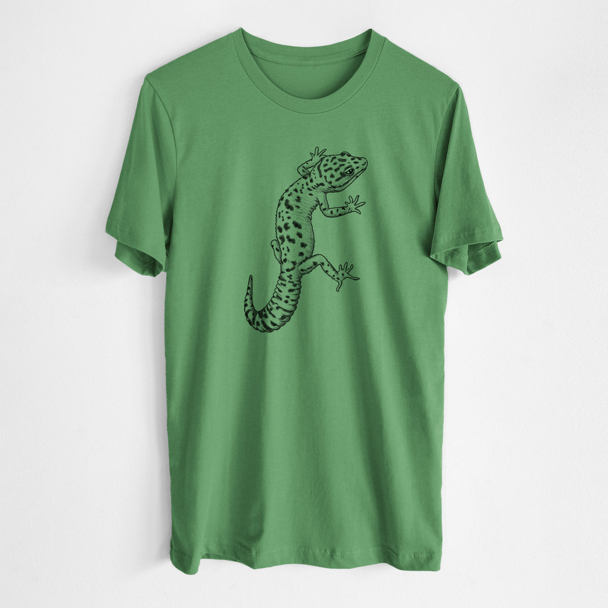 Leaf green lightweight cotton t-shirt laid flat, printed with a detailed black ink illustration of a spotted leopard gecko climbing.
