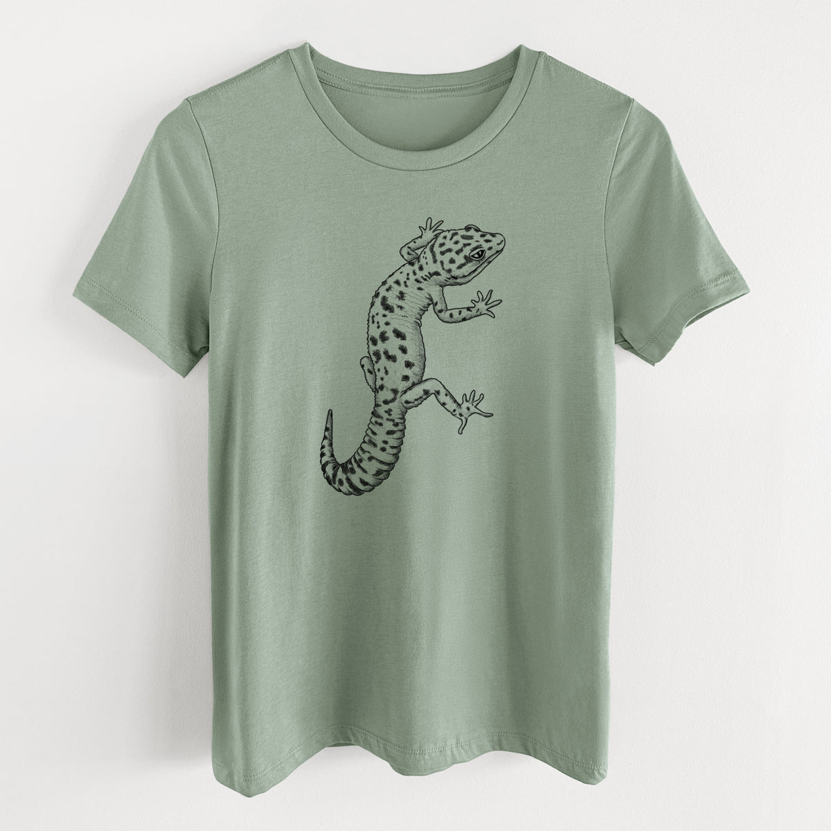 Sage green women's relaxed fit cotton t-shirt laid flat, printed with a detailed black ink illustration of a spotted leopard gecko climbing.