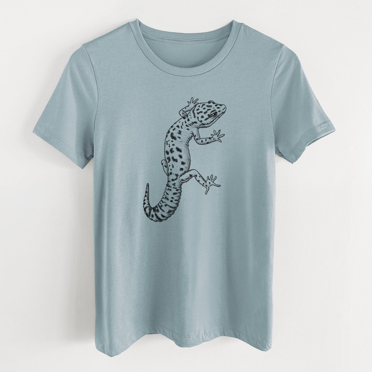 Vintage denim women's relaxed fit cotton t-shirt laid flat, printed with a detailed black ink illustration of a spotted leopard gecko climbing.