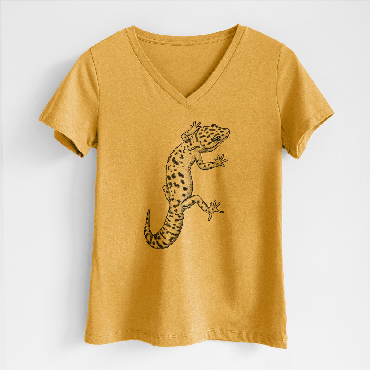 Honeycomb yellow women's relaxed fit cotton V-neck t-shirt laid flat, printed with a detailed black ink illustration of a spotted leopard gecko climbing.