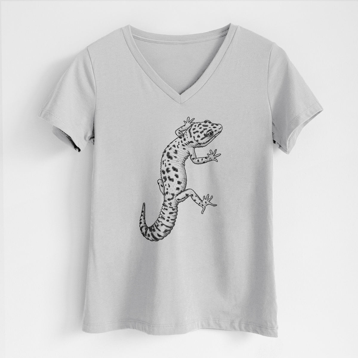 Lunar grey women's relaxed fit cotton V-neck t-shirt laid flat, printed with a detailed black ink illustration of a spotted leopard gecko climbing.