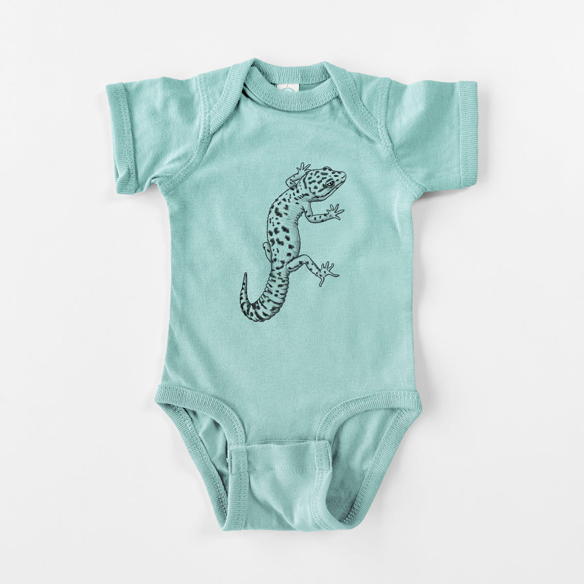 Saltwater baby bodysuit laid flat, printed with a detailed black ink illustration of a spotted leopard gecko climbing.