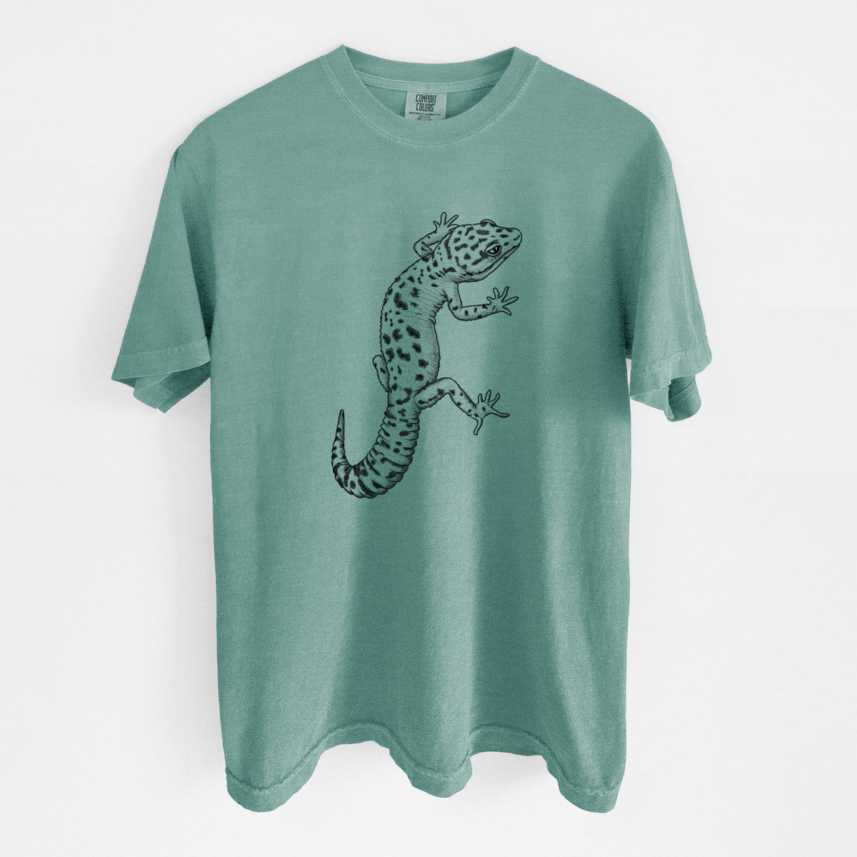 Reef green Comfort Colors t-shirt laid flat, printed with a detailed black ink illustration of a spotted leopard gecko climbing.