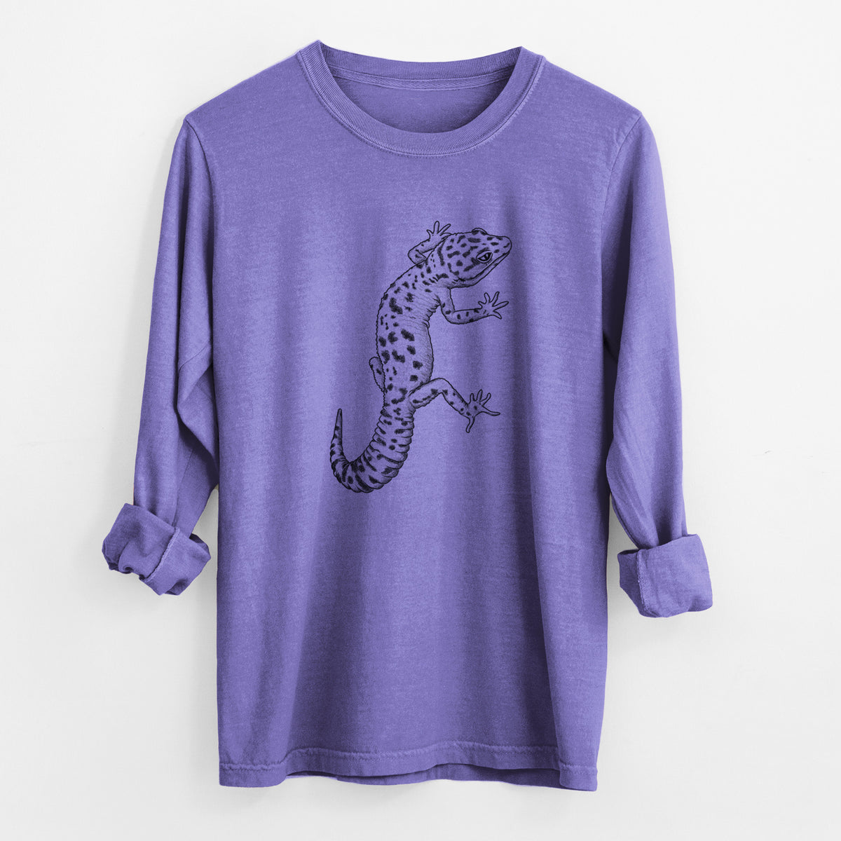 Violet purple Comfort Colors long sleeve shirt laid flat with the cuffs rolled, printed with a detailed black ink illustration of a spotted leopard gecko climbing.