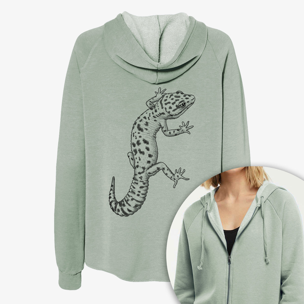 Women's Cali Wave zip-up sweatshirt printed with a detailed black ink illustration of a spotted leopard gecko climbing, with a close-up of the zipper.