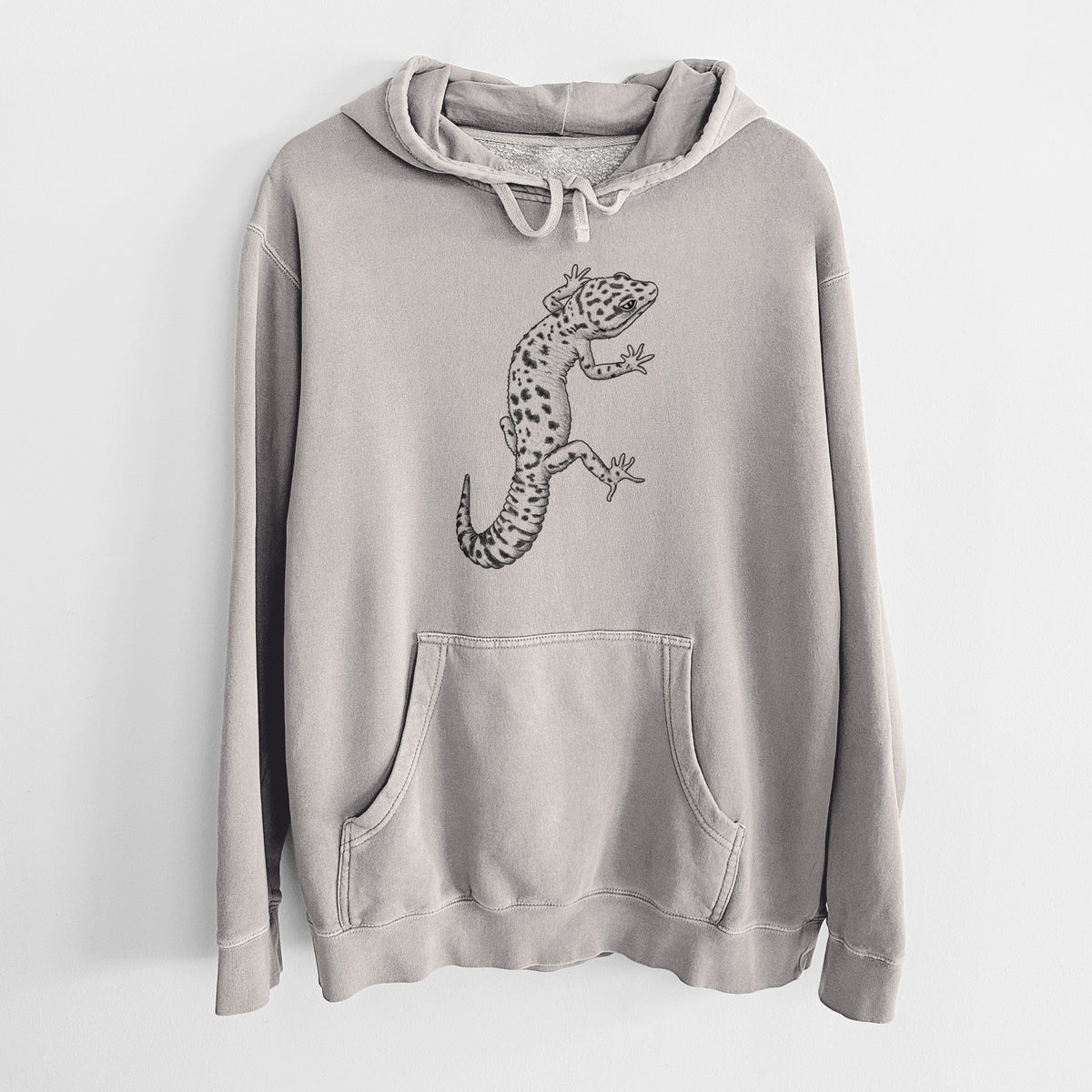 Cement grey pigment dyed hoodie laid flat, printed with a detailed black ink illustration of a spotted leopard gecko climbing.