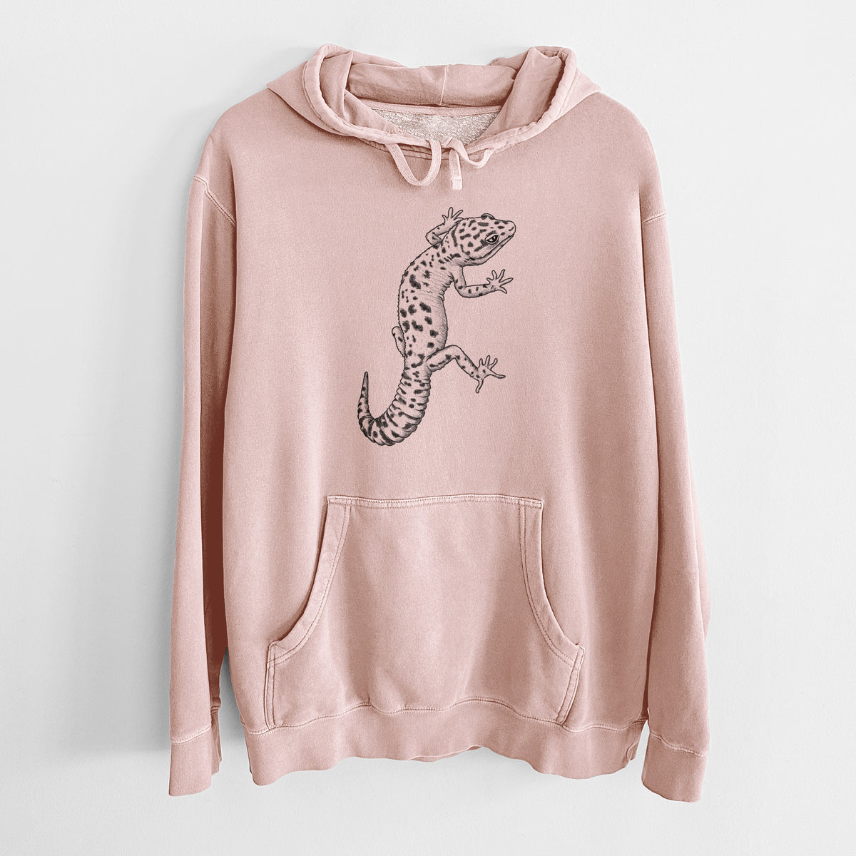 Dusty pink pigment dyed hoodie laid flat, printed with a detailed black ink illustration of a spotted leopard gecko climbing.