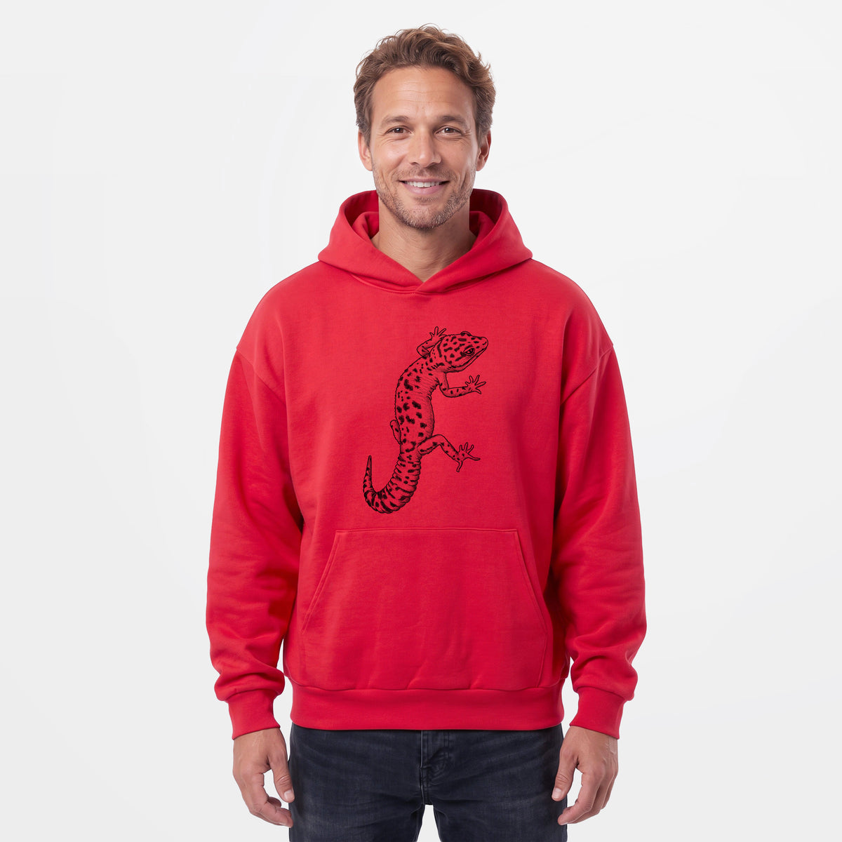 Male model wearing the Eublepharis macularius - Leopard Gecko - Statement Midweight Hoodie.