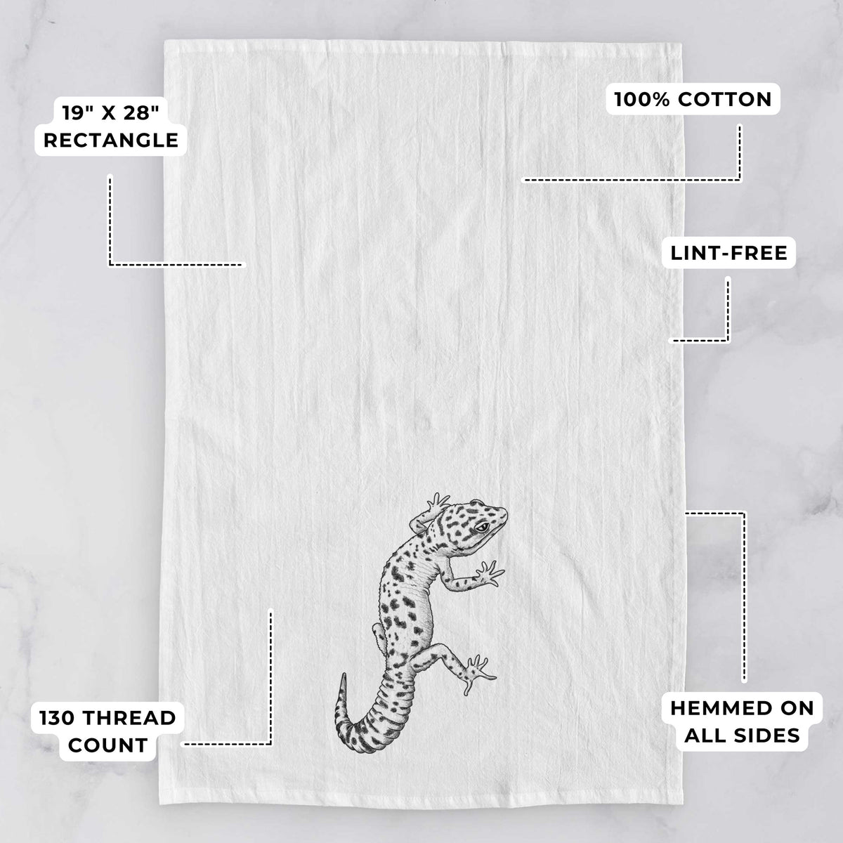 White tea towel printed with a detailed black ink illustration of a spotted leopard gecko climbing, with feature labels: 19 by 28 inch rectangle, 100% cotton, lint-free, 130 thread count, hemmed on all sides.