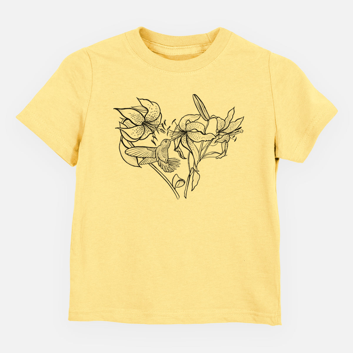 Butter yellow toddler t-shirt laid flat, printed with a black ink line drawing of lilies and a hummingbird arranged in a heart shape.