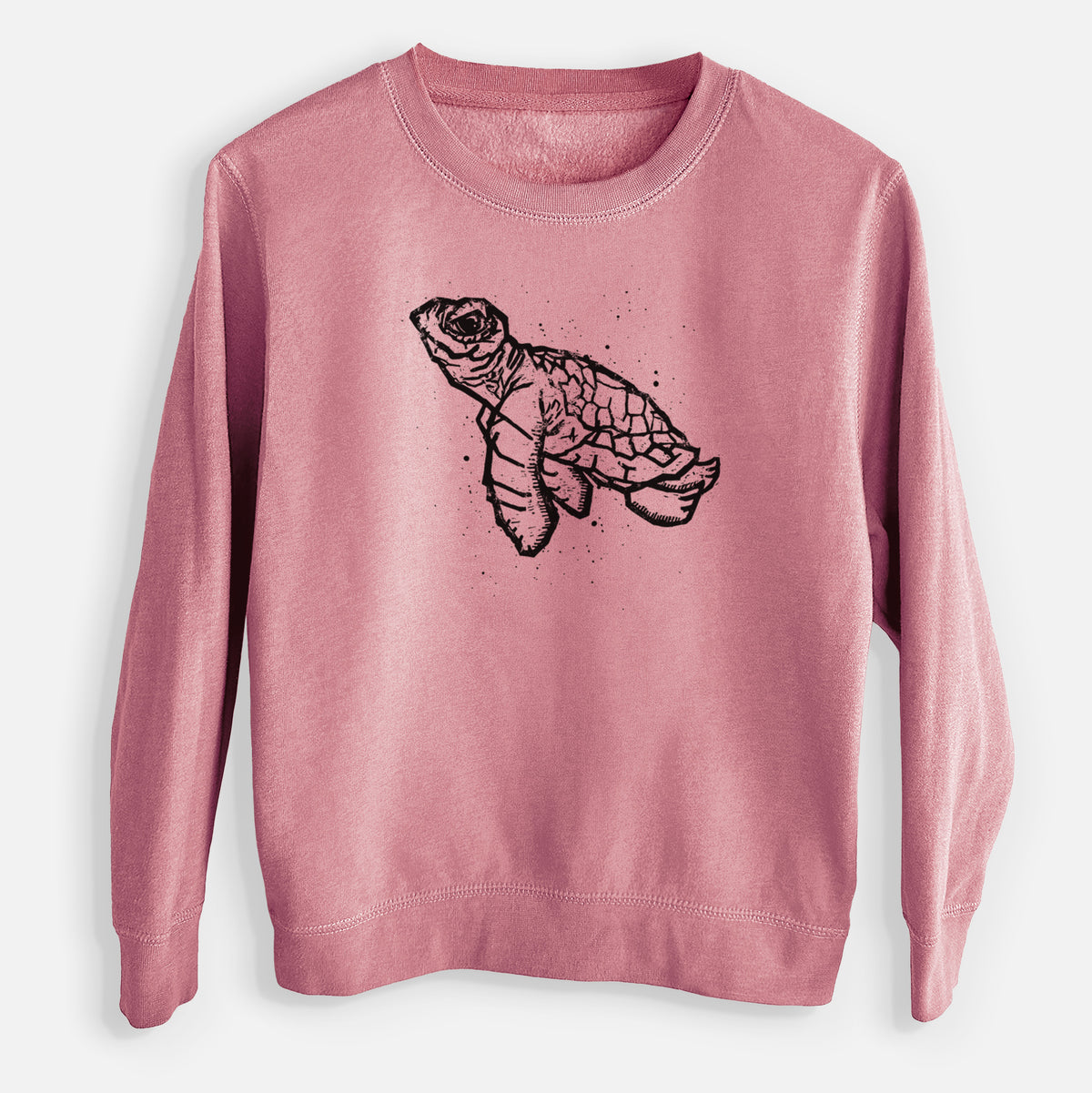Mauve pink youth crewneck sweatshirt laid flat, printed with a black linocut-style illustration of a baby sea turtle with a patterned shell and ink splatters.