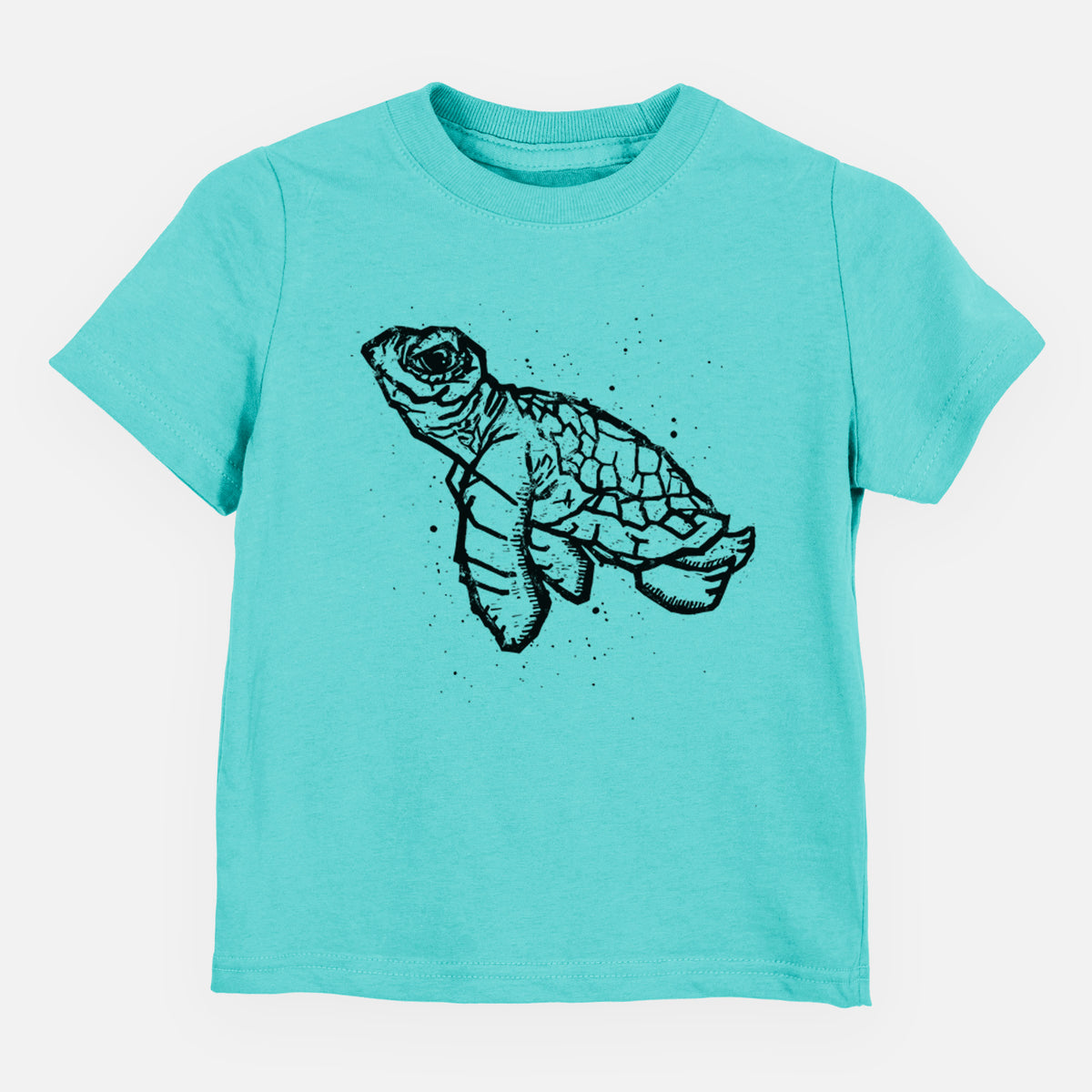 Caribbean blue toddler t-shirt laid flat, printed with a black linocut-style illustration of a baby sea turtle with a patterned shell and ink splatters.