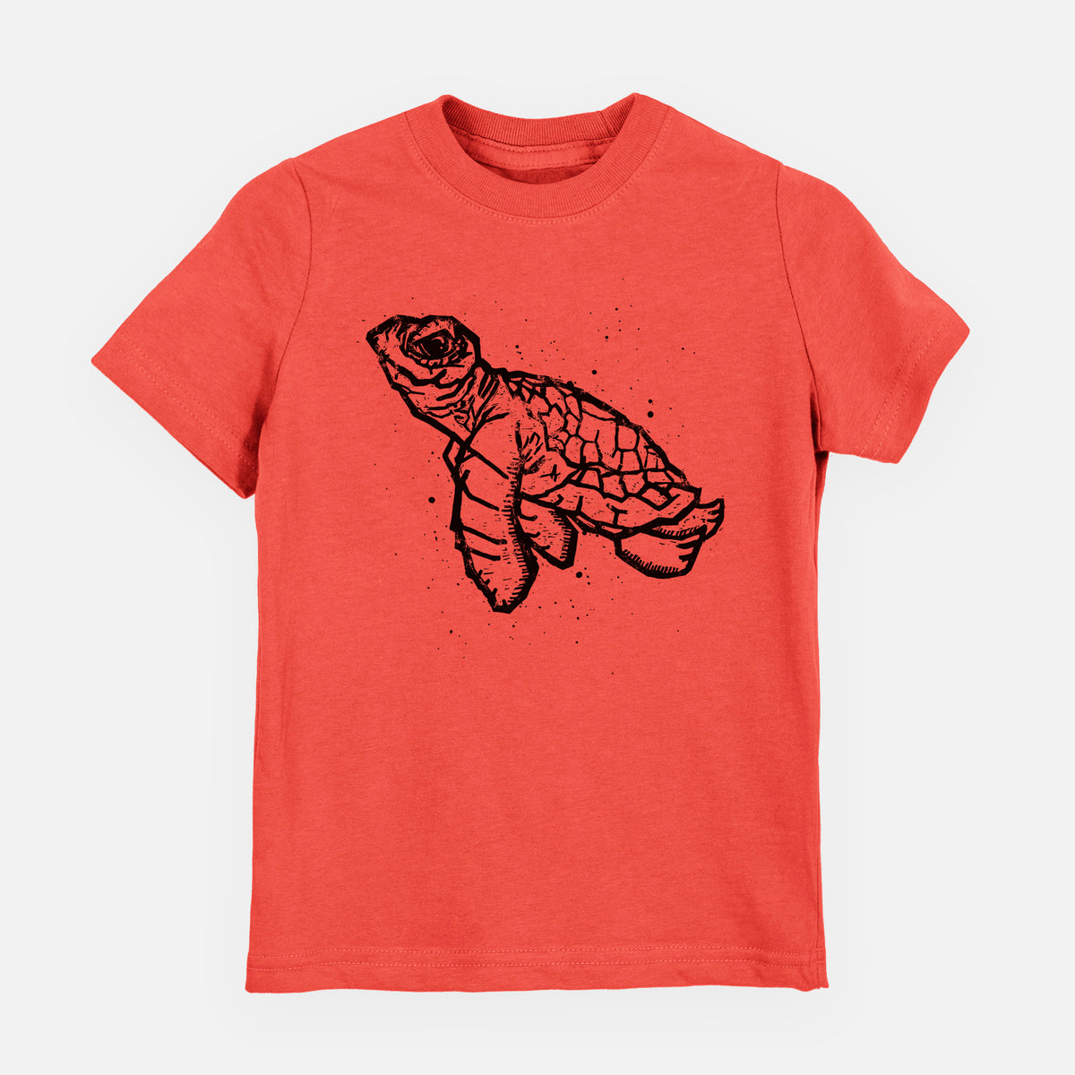 Passionfruit pink youth t-shirt laid flat, printed with a black linocut-style illustration of a baby sea turtle with a patterned shell and ink splatters.